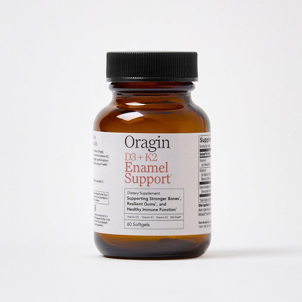 Brown supplement bottle labeled 'Oragin' on a white background