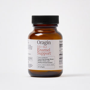 Brown supplement bottle labeled 'Oragin' on a white background