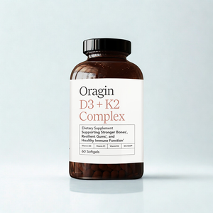 Supplement bottle labeled 'Oragin D3 + K2 Complex' on a light gray background
